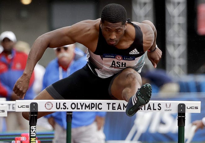 Ronnie Ash wins the second heat in the 110-meter hurdles at the U.S. Olympic Track and Field Trials on July 8. ASSOCIATED PRESS / MARCIO JOSE SANCHEZ