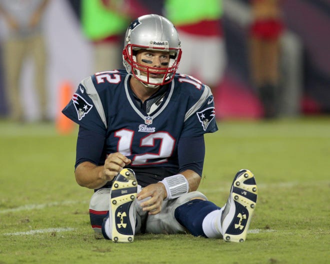 Quarterback Tom Brady will miss the first four games of the NFL season. Margaret Bowles/The Associated Press