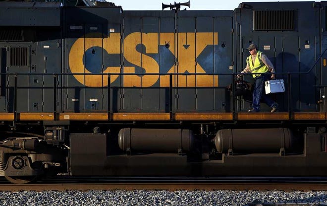 Associated Press CSX reports of a 20 percent decline in second-quarter profits beat Wall Street expectations with slashed costs.