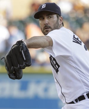 Detroit Tigers starting pitcher Justin Verlander throws during the first inning of a baseball game against the Kansas City Royals, Friday, July 15, 2016 in Detroit. (AP Photo/Carlos Osorio)