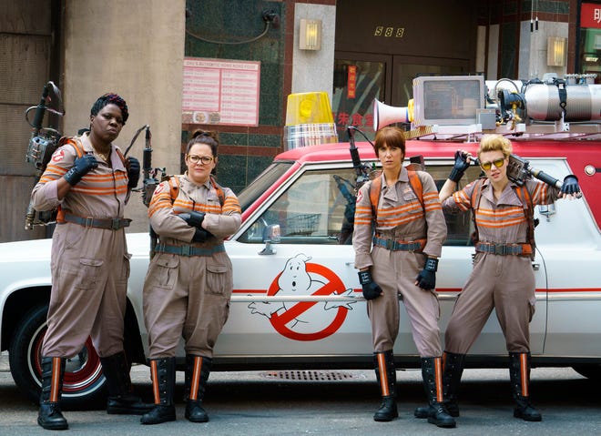 In this image released by Sony Pictures, from left, Leslie Jones, Melissa McCarthy, Kristen Wiig and Kate McKinnon appear in a scene from the film, "Ghostbusters," opening nationwide on July 15. (Hopper Stone/Columbia Pictures, Sony via AP)