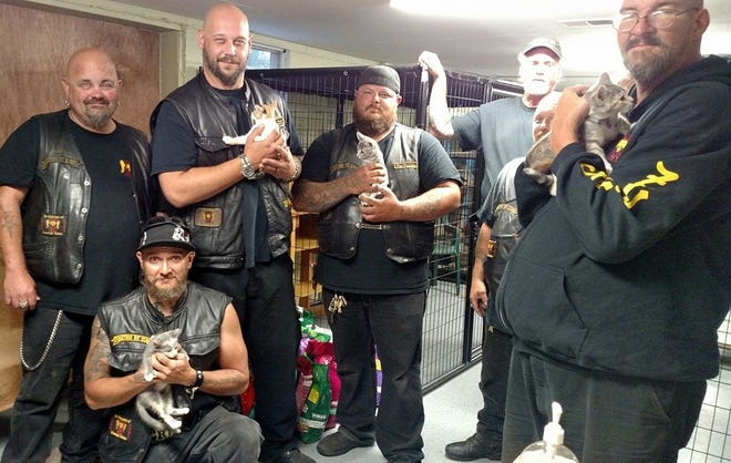 Members of the Zulus Holland Motorcycle Club pose with kittens at Best Pals Animal Rescue Center earlier this month after they dropped off donations for the no-kill shelter.

Contributed