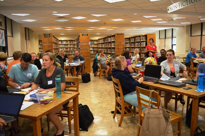 About 25 Freeport middle and high school teachers gathered at the Freeport High School library Wednesday, July 13, 2016, to learn more about math curriculum changes being implemented next school year. SUSAN VELA/STAFF PHOTOGRAPHER/THE JOURNAL-STANDARD