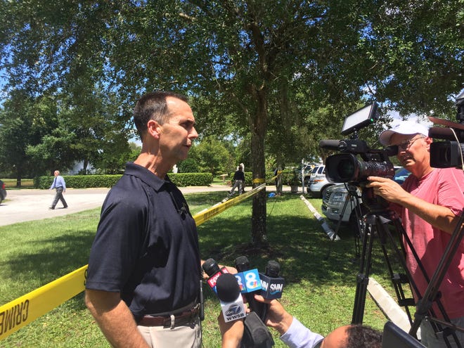 Manatee County Sheriff's Office spokesman Dave Bristow says the agency has classified the death of a man whose body was found behind a church on Friday as a homicide.