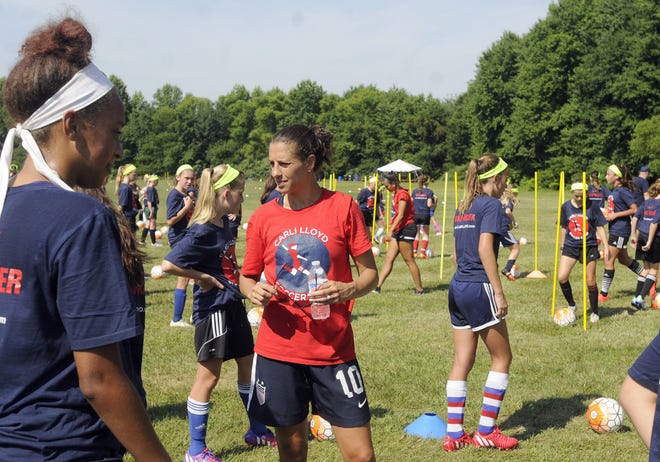 U.S. Soccer's Carli Lloyd watches players go through drills at Carli Lloyd soccer camp in summer 2016, at Ark Road Soccer Complex, Medford.