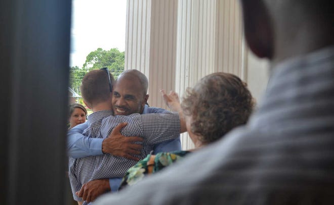 Hilary Butschek/Staff Community Connection director Fenwick Broyard, who gave his first sermon at Hill Chapel Baptist Church on Sunday, July 17, 2016 before going to divinity school, greets members of the church after service. Hilary Butschek/ OnlineAthens