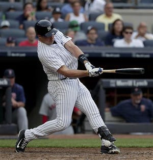 New York Yankees' Mark Teixeira fouls the ball off his ankle during the fourth inning of a baseball game against the Boston Red Sox, Saturday, July 16, 2016, in New York. (AP Photo/Julie Jacobson)