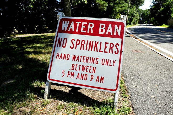 Water ban signs are appearing around the cities and towns of the Commonwealth with rain being scarce this year. This sign appeared along Rt. 97 in Wenham recently. Wicked Local Staff Photo / Kirk R. Williamson
