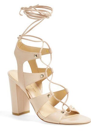 At Nordstrom, the Ivanka Trump nude lace up criss-cross block heel with studs.