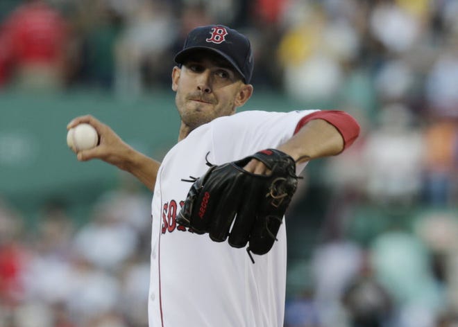 Rick Porcello delivers a pitch during the first inning of Boston's 4-0 victory over San Francisco on Tuesday.