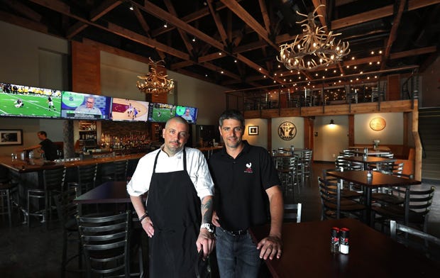 Brothers Tommy Gallo, left, and Nick Gallo at the new Gallo's Tap Room in Powell, Ohio.