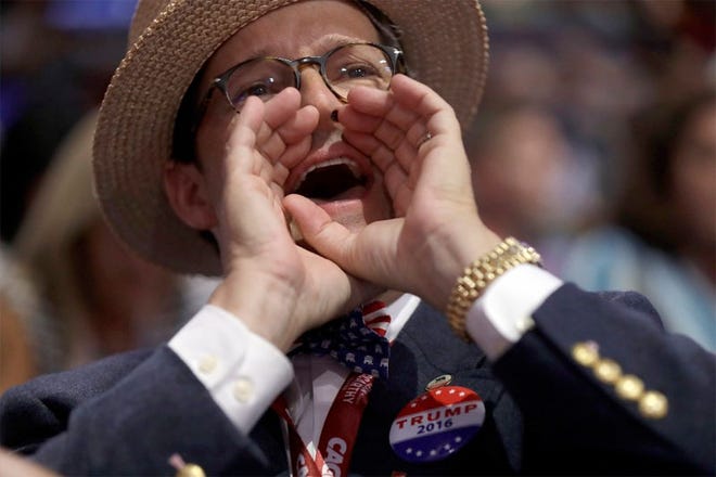 Eric Laykin from Los Angeles yells during the second day session of the Republican National Convention in Cleveland.