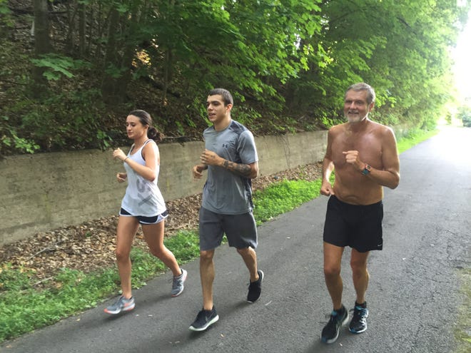Kelly Sheridan, Lee Iglesias and Bob McGrath on the Heritage Trail on Saturday. Some runners, walkers, cyclists, skiers and skaters make the trail part of their lifestyles; for others, it’s a Saturday indulgence. Photo provided