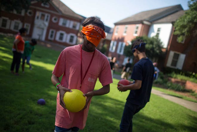Students from Money Dawgs play a team building game at the University of Georgia, Wednesday, July 20, 2016. (Photo/ John Roark, Athens Banner-Herald)