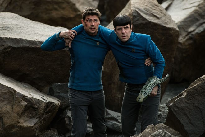 Karl Urban portrays Bones (left) and Zachary Quinto is Spock in "Star Trek Beyond."