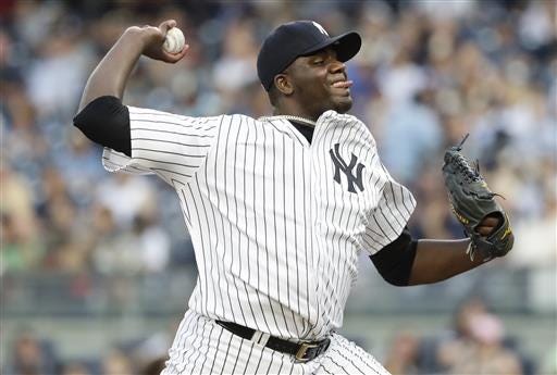 New York Yankees' Michael Pineda delivers a pitch during the first inning of a baseball game against the Baltimore Orioles Wednesday, July 20, 2016, in New York. (AP Photo/Frank Franklin II)
