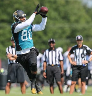 Jacksonville Jaguar tight end Julius Thomas (80) catches a pass during NFL football minicamp practice on Tuesday, June 14, 2016 in Jacksonville, Fla. (AP Photo/Gary McCullough)