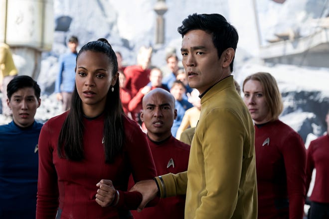 Uhura (Zoe Saldana) has a moment of self doubt with Sulu (John Cho) in “Star Trek Beyond.” (Paramount Pictures)