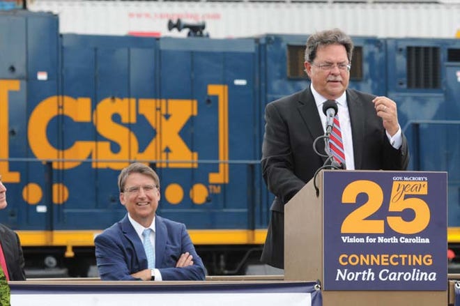 CSX CEO Michael Ward speaks to the crowd after Gov. Pat McCrory joined officials from the N.C. Department of Transportation and CSX Corp. at the Port of Wilmington to announce the debut of the new Queen City Express, an intermodal rail service between the Port of Wilmington and CSX’s intermodal terminal in Charlotte.