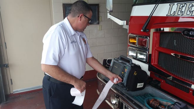 Deputy Fire Chief Joe Mera shows off a new LifePak Monitor his Leesburg Fire Department used Friday for the first time. The monitor allows crews to transfer readings on heart attack patients directly to a hospital by cellphone towers.