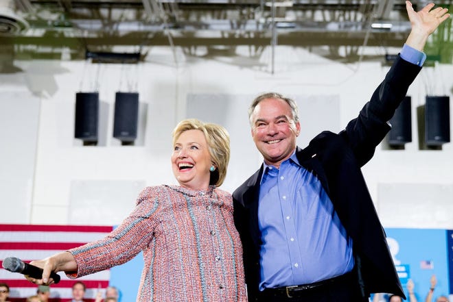 Democratic presidential candidate Hillary Clinton and Sen. Tim Kaine, D-Va., participate in a rally at Northern Virginia Community College in Annandale, Va., Thursday, July 14, 2016. Kaine has been rumored to be one of Clinton's possible vice president choices. (AP Photo/Andrew Harnik)