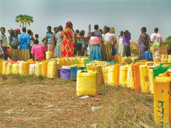 South Sudan is the newest country on Earth, formed in 2011. It's also among the poorest, and the location of the newest sustainable water project through California-based nonprofit Water Charity. Here villagers are shown waiting to fill water jugs.