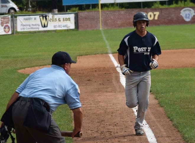 Collin Shapiro scores a run for the Exeter Post 32 American Legion baseball team in Saturday's 8-3 state tournament win over Bedford at Holman Stadium in Nashua. Mike Zhe/Seacoastonline
