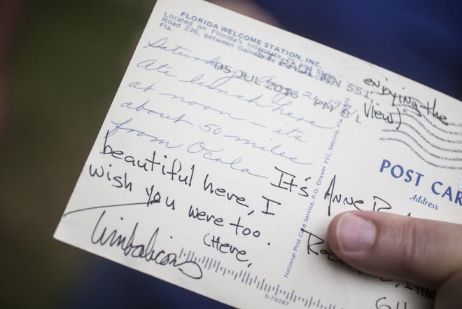 Anne Baldwin's brother Tim Roe added his script to a postcard from 1971. The postcard, photographed on Wednesday, July 20, 2016, was mistakenly delivered to Baldwin's neighbors, Reed and Debbie Schreck. SUNNY STRADER/STAFF PHOTOGRAPHER/RRSTAR.COM