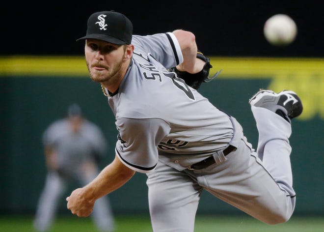 In this Monday, July 18, 2016, file photo, Chicago White Sox starting pitcher Chris Sale throws to a Seattle Mariners batter during a baseball game in Seattle. Sale was scratched from his start against the Detroit Tigers on Sunday after he was involved in what the team says was a "non-physical clubhouse incident."