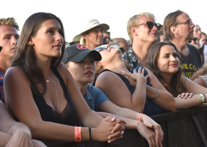 Folk Fans look on as Alabama Shakes takes the stage Sunday.