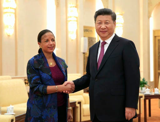 U.S. National Security Advisor Susan Rice, left, and Chinese President Xi Jinping pose for photographers during their meeting at the Great Hall of the People in Beijing, China, Monday, July 25, 2016. (How Hwee Young/Pool Photo via AP)