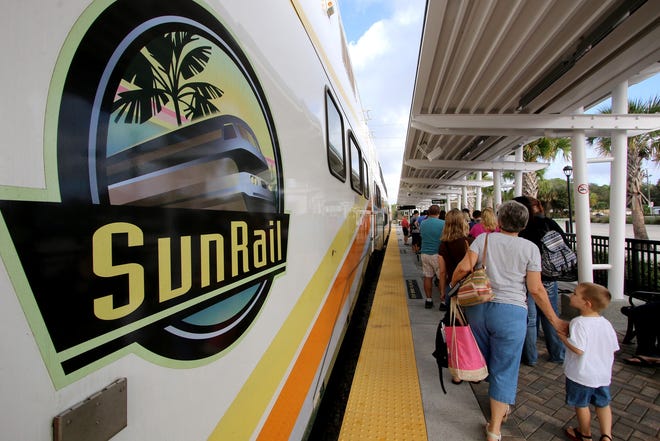 People pack the DeBary SunRail station waiting to catch the 10am south bound train Tuesday morning December 29, 2015. News-Journal/JIM TILLER