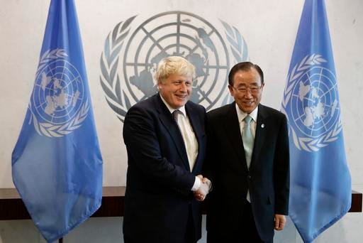 Britain's Foreign Secretary Boris Johnson, left, shakes hands with U.N. Secretary-General Ban Ki-moon at United Nations headquarters Friday, July 22, 2016. (AP Photo/Frank Franklin II)