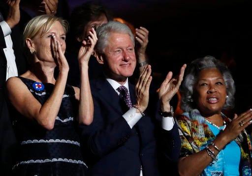 AP Photo/Paul Sancya - Former President Bill Clinton applauds Former Democratic Presidential candidate, Sen. Bernie Sanders, I-Vt., as he speaks during the first day of the Democratic National Convention in Philadelphia , Monday, July 25, 2016.