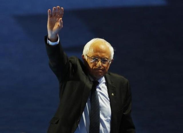 Senator Bernie Sanders (D-VT) waves while leaving the stage after addressing the Democratic National Convention in Philadelphia, Pennsylvania, U.S. July 25, 2016. REUTERS/Scott Audette