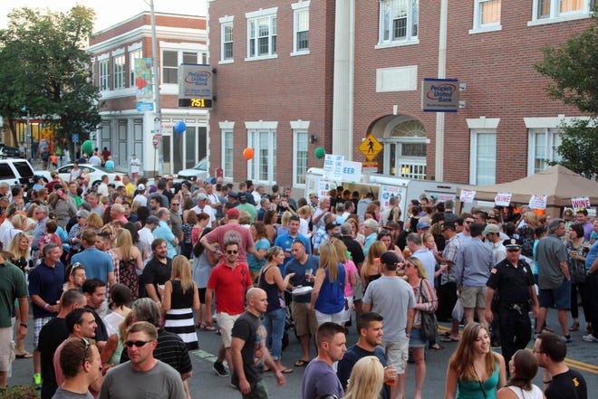 Attendees enjoy THE BLOCK, a downtown street party organized by Beverly Main Streets. Courtesy photo