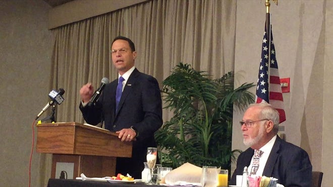 Montgomery County Commissioner Chairman Josh Shapiro addresses the Pennsylvania Democratic delegation at a breakfast during the Democratic National Convention in Philadelphia, Wednesday, July 27, 2016. Shapiro is a Democratic candidate for Pennsylvania Attorney General. Seated is Pennsylvania Democratic Party Chairman Marcel Groen.
