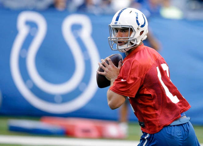 The Colts' Andrew Luck runs a drill during practice in Indianapolis on June 8.