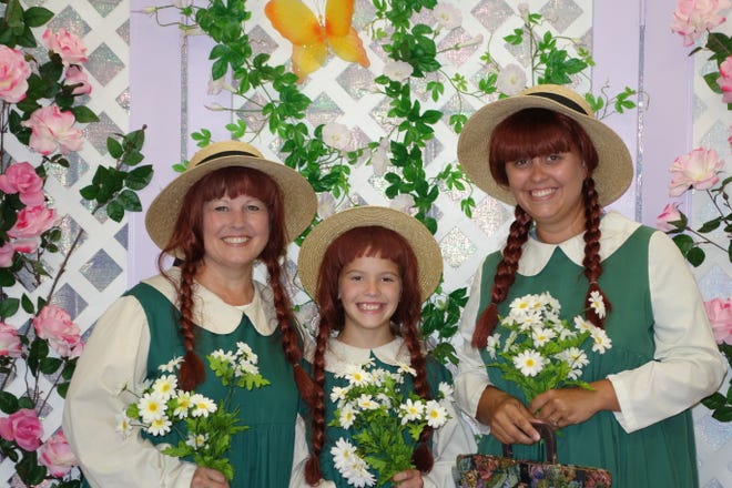The Dish (left), Riley (center) and Haley dress up as Anne of Green Gables on Sunday in Borden-Carelton.