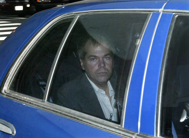 In this Nov. 18, 2003 file photo, John Hinckley Jr. arrives at U.S. District Court in Washington. A judge says Hinckley, who attempted to assassinate President Ronald Reagan will be allowed to leave a Washington mental hospital and live full-time in Virginia. (AP Photo/Evan Vucci, File)