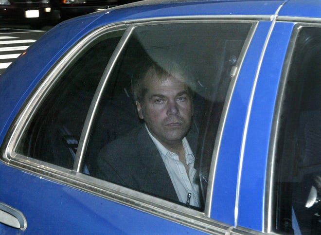 FILE - In this Nov. 18, 2003 file photo, John Hinckley Jr. arrives at U.S. District Court in Washington. A judge says Hinckley, who attempted to assassinate President Ronald Reagan will be allowed to leave a Washington mental hospital and live full-time in Virginia. (AP Photo/Evan Vucci, File)