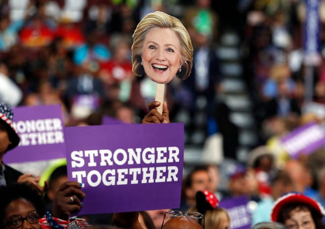 Delegates hold up signs to show their support for Democratic Presidential candidate Hillary Clinton during the third day session of the Democratic National Convention in Philadelphia, Wednesday, July 27, 2016. (AP Photo/Carolyn Kaster)