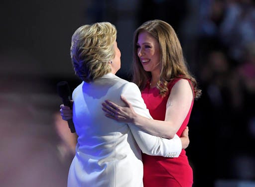 Chelsea Clinton, embraces her mother, Democratic presidential nominee Hillary Clinton, during the final day of the Democratic National Convention in Philadelphia.