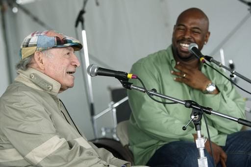 In this Aug. 9, 2009, file photo, George Wein, left, talks with bassist Christian McBride at the Newport Jazz Festival in Newport. McBride, who has performed regularly at Newport since 1991, will perform at the festival on Friday, Aug. 5, 2016. Wein is turning over artistic direction of the festival to McBride in 2017.