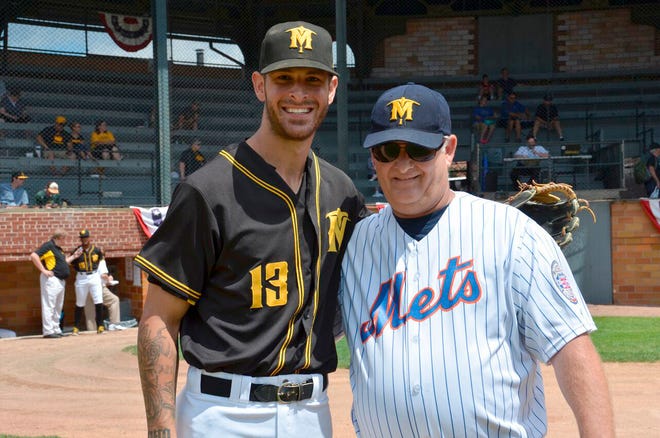 Photo by Dennis Mark/Sussex County Miners — Ron Rosendale, of Frankford, stands with Miners shortstop Steve Nyisztor, who is spending the summer with Rosendale's "host family." An ardent Miners fan, Rosendale was chosen by the team to throw out the first pitch at Tuesday's game — and he delivered a strike.