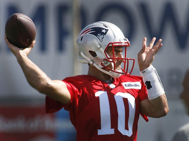 The Patriots opened their first day of training camp with all eyes on Jimmy Garoppolo who will start the first four games of the season for suspended Tom Brady, who did train with the team on Thursday. Greg Derr/ The Patriot Ledger.