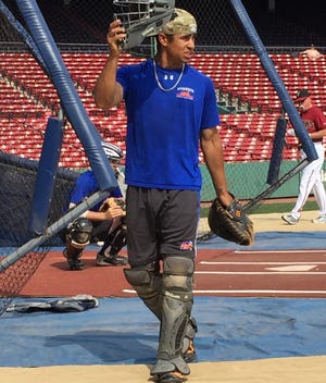 Hyannis Harbor Hawk Benito Santiago Jr. in action at a Fenway Park practice. PHOTO BY MIKE RICHARD