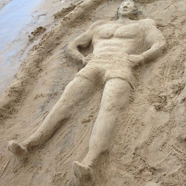 The Bereck family's Arnold Schwarzenegger sand man on the beach of Lake Erie was a big hit with passers-by.