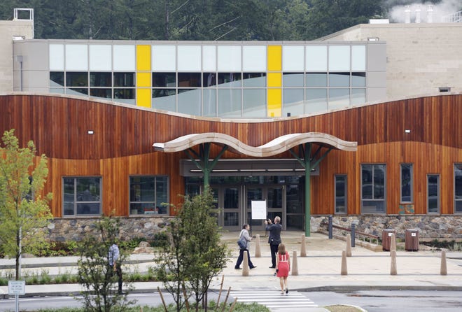 The new Sandy Hook Elementary School hosts a media open house, Friday, July 29, 2016, in Newtown, Conn. The public is getting its first look at the school which will replace the one torn down after a gunman entered it in December 2012 and killed 20 first graders and six educators. The $50 million, 86,800-square-foot building opens next month. (AP Photo/Mark Lennihan)