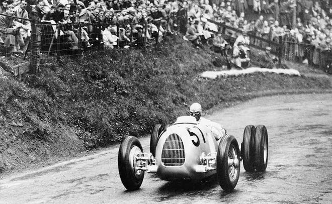 Provided by Shelsley Walsh This black and white photo shows Hans Stuck Sr. driving the Auto Union V16 race car up the Shelsley Walsh hillclimb in 1936.